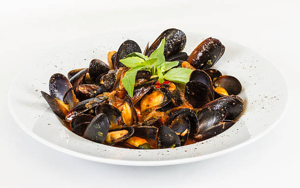 istock close up on mussels on white background 498079713