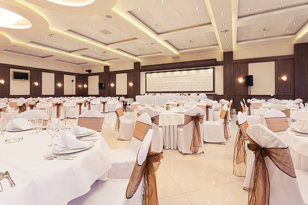 Banquet hall decorated for special occasion Banquet hall decorated for special occasion wedding hall stock pictures, royalty-free photos & images