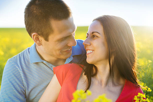 istock Couple in love in field 498085365