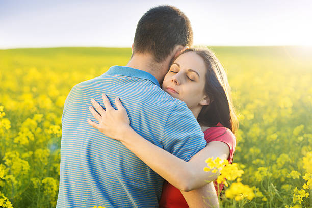 istock Couple in love in field 498085461
