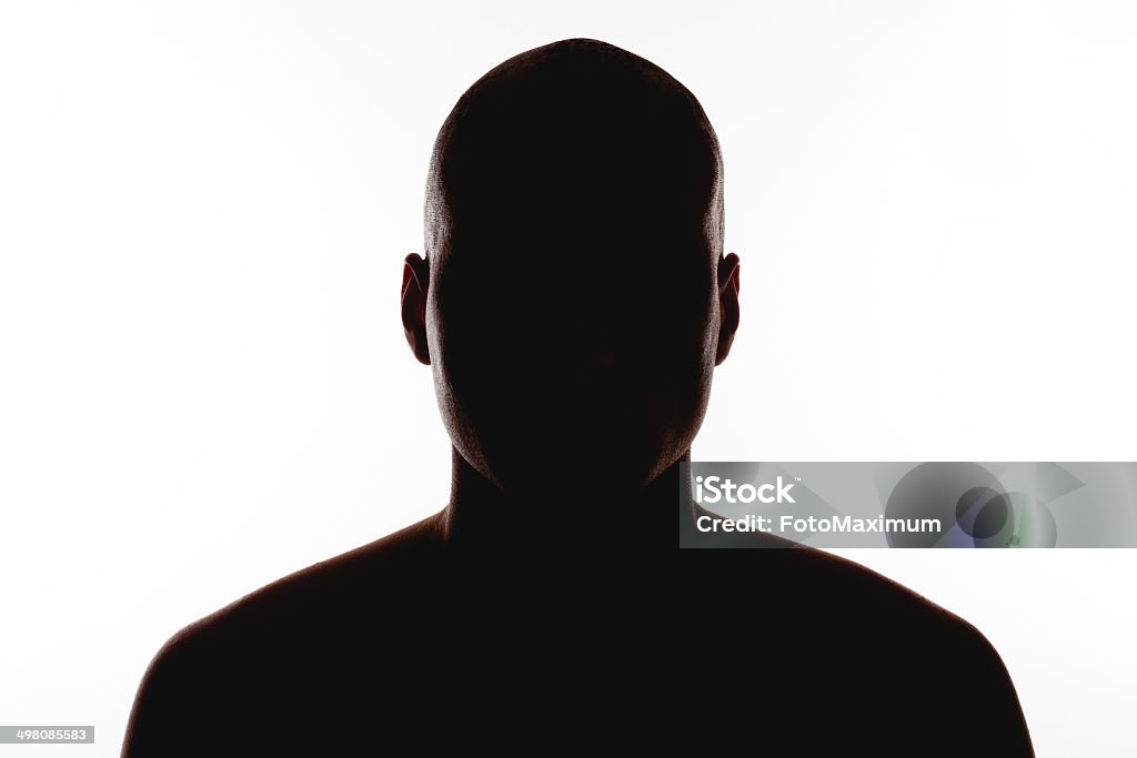 Silueta del hombre sobre un fondo blanco - Foto de stock de Silueta libre de derechos