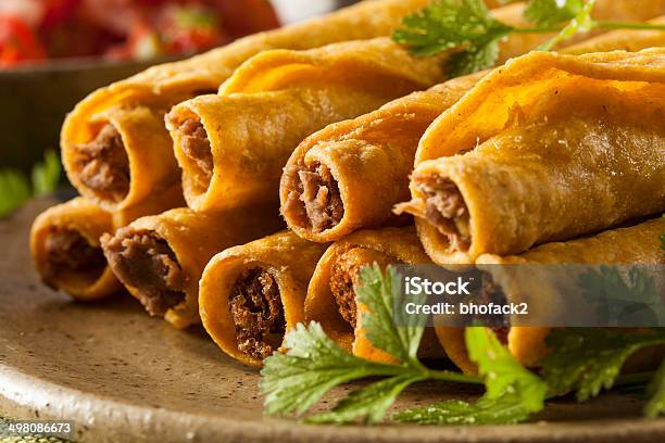 Homemade Mexican Beef Taquitos Stock Photo - Download Image Now - Taquito, Appetizer, Beef