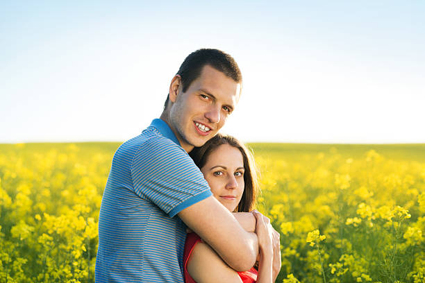 istock Couple in love in field 498086785