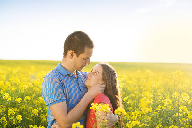 istock Couple in love in field 498086787