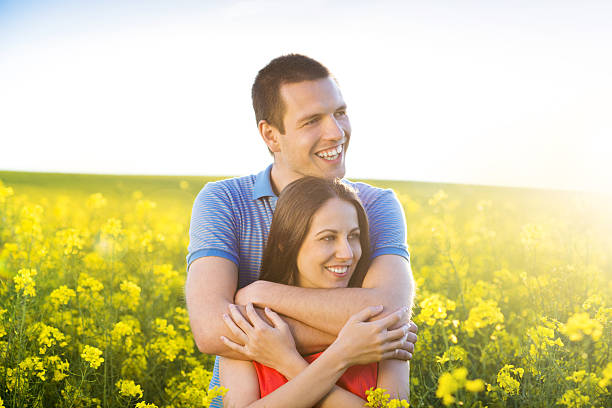 istock Couple in love in field 498086789
