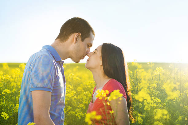 istock Couple in love in field 498086793