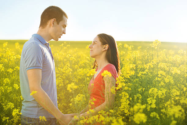 istock Couple in love in field 498086797