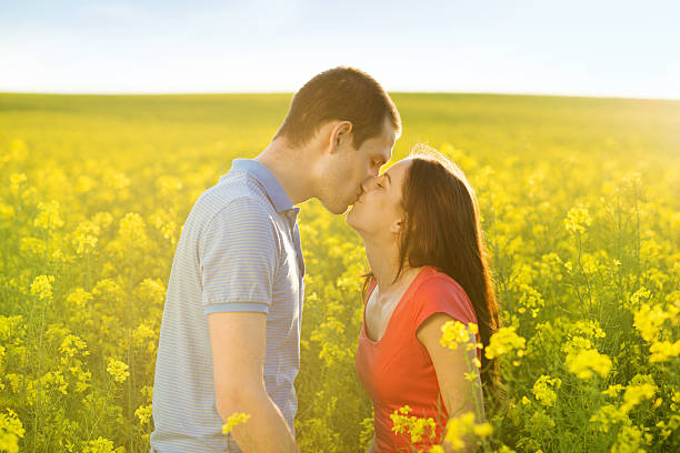 istock Couple in love in field 498086803