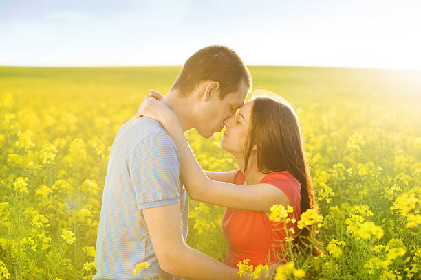 istock Couple in love in field 498086805