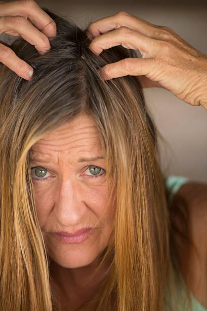 istock Stressed Woman tearing her hair 498093338