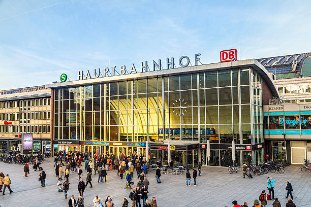 Cologne, Germany - December 3, 2013: people on the main train station in Cologne in Germany. The central station was inaugurated in 1894.