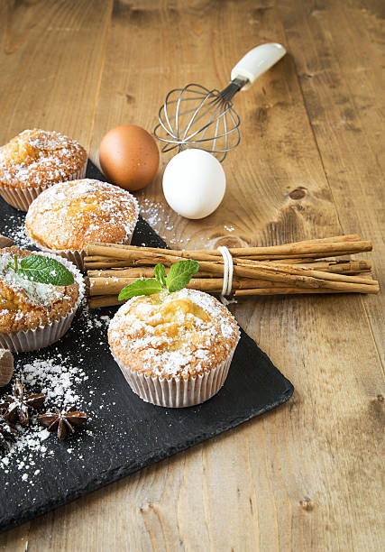 istock Homemade muffins with star anise, cinnamon and mint 498097276