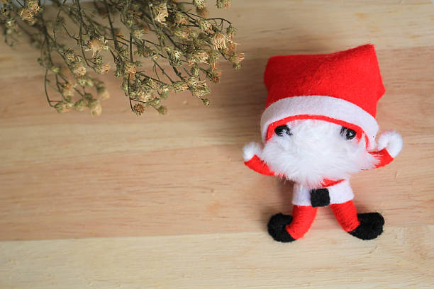istock Santa Claus doll on wood background 498097568