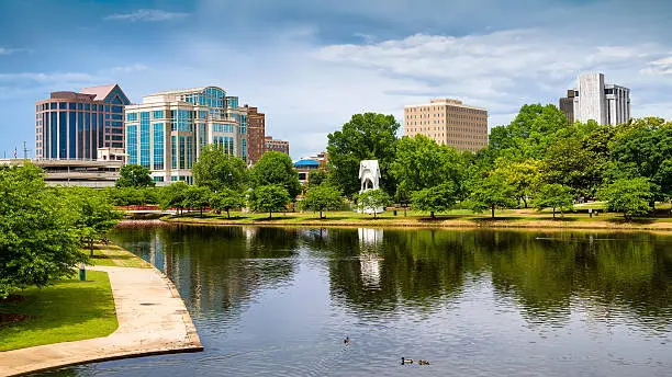Cityscape scene of downtown Huntsville, Alabama, from Big Spring Park during the day