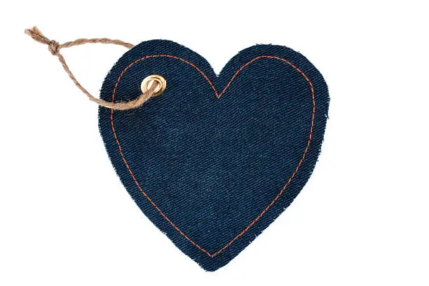 Photo of Price tag made of denim in the form of heart