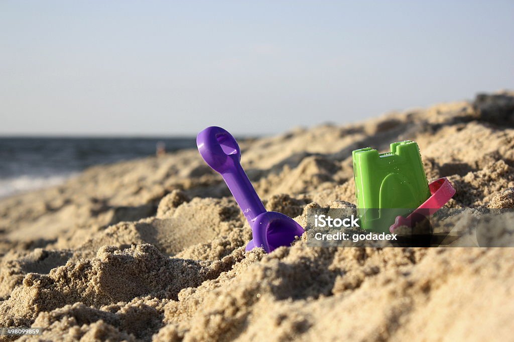 Plastic toys for beach Children's beach toys on sand on a sunny day Beach Stock Photo