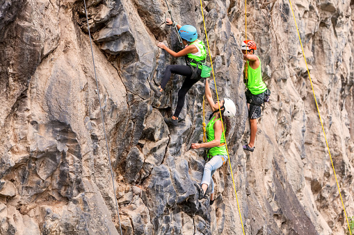 Banos, Ecuador - 30 November 2014: Basalt Challenge Of Tungurahua, Group Of Brave Climbers Climbing A Rock Wall In Banos On November 30, 2014