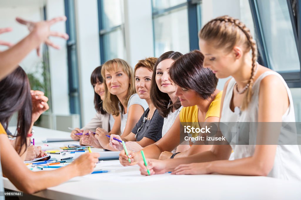 Group of women at the training Group of women attending a training, working together and discussing. Only Women Stock Photo