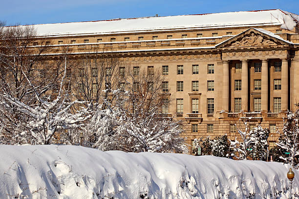 istock Justice Department After the Snow Constitution Avenue Washington 498104929