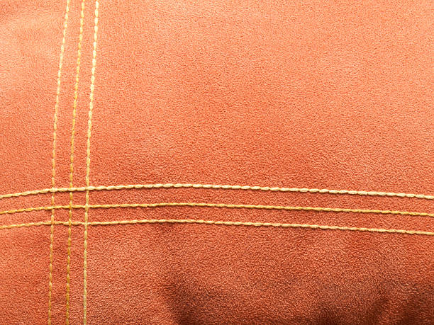 istock Orange velvet texture with lines as background 498105611