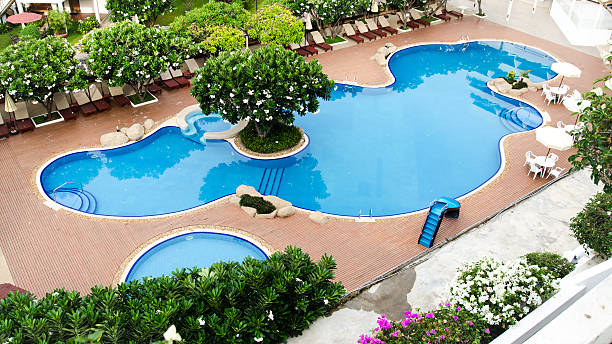 Cool blue summer holiday pool stock photo