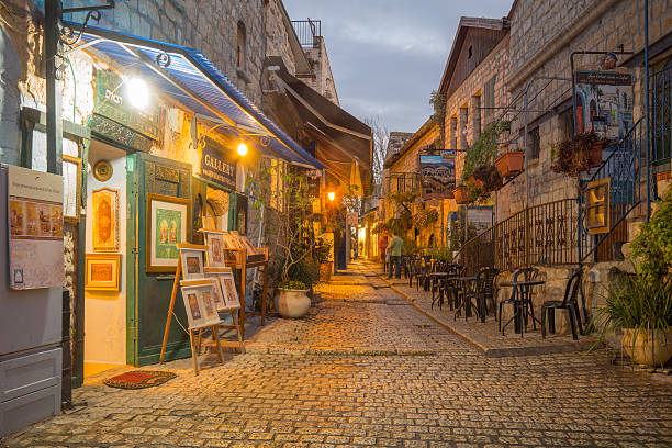 Alley Scene, Safed (Tzfat) Safed, Israel - November 17, 2015: Sunset scene in an ally in the Jewish quarter, with local businesses, in Safed (Tzfat), Israel galilee photos stock pictures, royalty-free photos & images