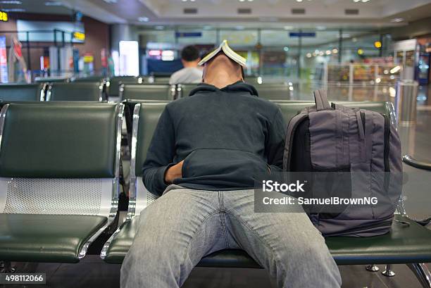 Waiting For A Night Flight In Airport Stock Photo - Download Image Now - Airport, Sleeping, Train - Vehicle