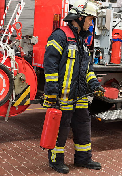istock Firefighter in action and used  a fire extinguisher 498112840