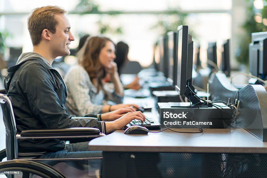 College Students Diverse college students working on computers. Adult Stock Photo