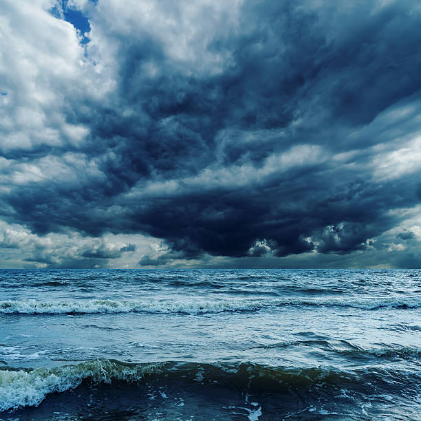 istock stormy sky over dark sea with waves 498116564