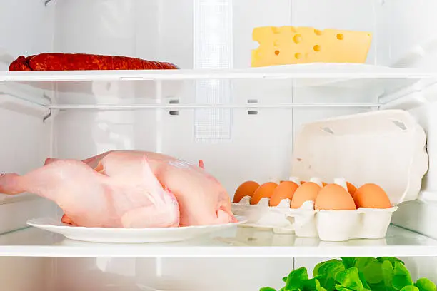 Horizontal shot shelves of the refrigerator with fresh food