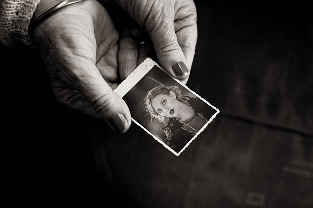 istock Showing an old Photograph 498116733