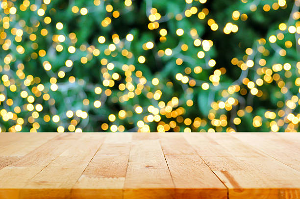 istock Wood table top on bokeh background from christmas tree 498117432