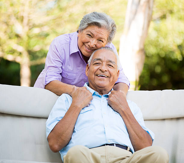 istock Senior couple holding hands 498117615