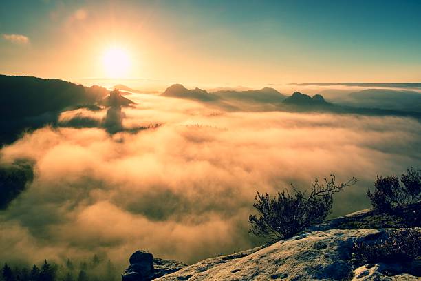istock Fantastic dreamy sunrise , rocky mountain with misty valley 498119680