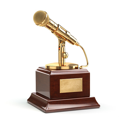 Music or journalism award concept. Gold microphone isolated on white. 3d