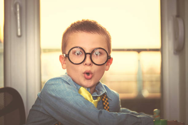 istock Little boy in round glasses 498125832