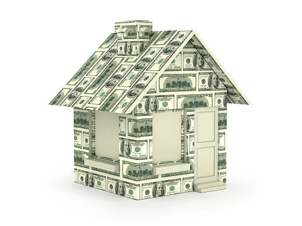 istock House made with Hundred Dollar Bills Isolated on White Background. 498126737