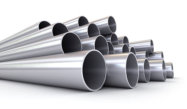 Stack of stainless steel pipes isolated on white Stainless steel pipes, brushed metal on white background. pipe tube stock pictures, royalty-free photos & images