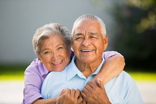 istock Loving senior couple hugging 498128591