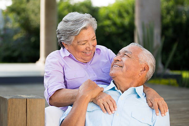 istock Hispanic senior couple looking at each other 498128593