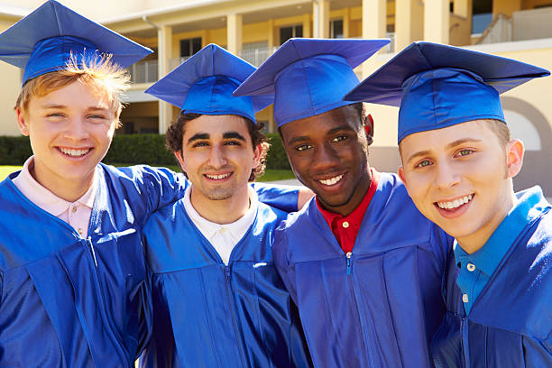 istock Group Of Male High School Students Celebrating Graduation 498129091
