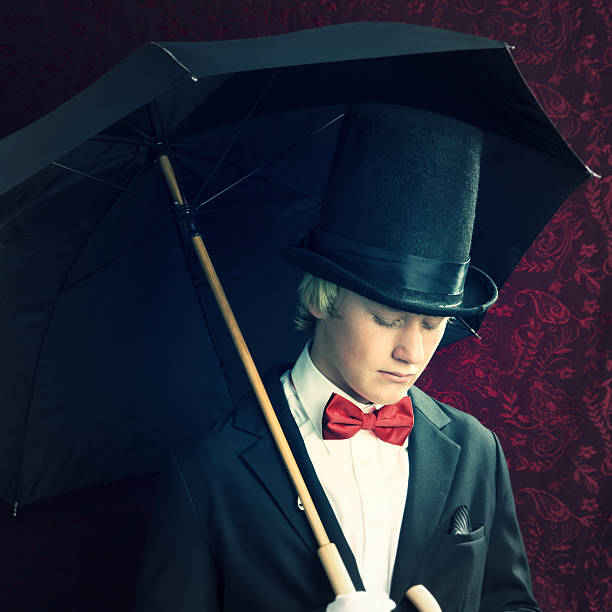 istock Boy Standing in Front of Wallpaper with Umbrella 498129671