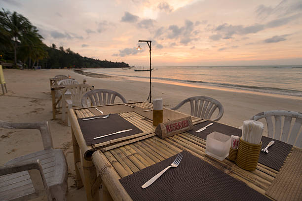 istock Reserved sign on a table at a beach restaurant 498130041