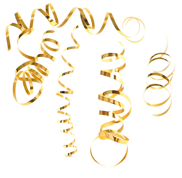 istock golden serpentine streamer. party decoration 498130707