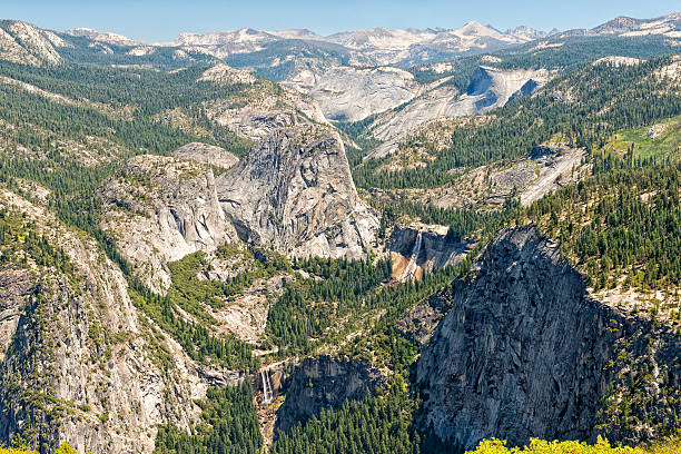 istock Beautiful sunny view of yosemite valley park half dome 498131011
