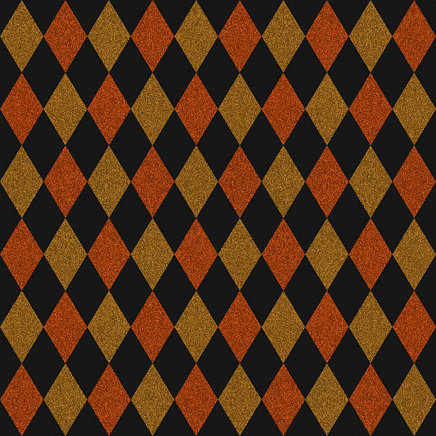 istock Seamless orange and gold glitter diamonds on black paper 498131659