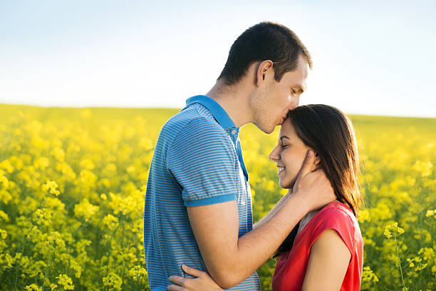 istock Couple in love in field 498132055