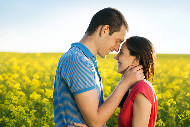 istock Couple in love in field 498132059