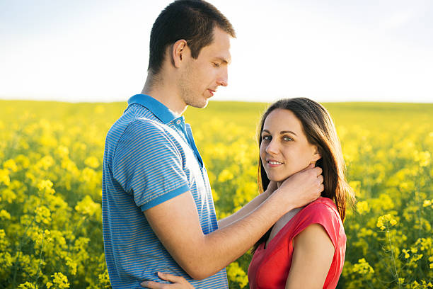 istock Couple in love in field 498132065